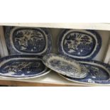 5 blue and white willow pattern meat platters.