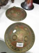 2 small oriental shields.