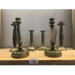 3 pairs of brass candlesticks.