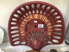 A cast iron Adriance Buckeye tractor implement seat.