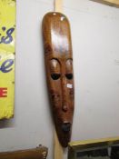 A large African wall mask.