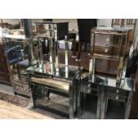 6 pieces of mirrored furniture (cupboard, drawers and 4 side tables).