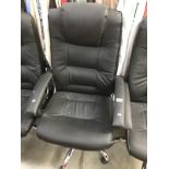 A black leather office chair.