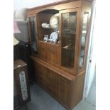 A teak effect wall unit.