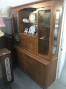 A teak effect wall unit.