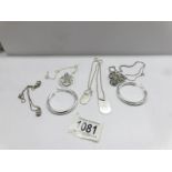 4 silver pendants and a pair of silver earrings, 42 grams.