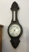 An Edwardian oak barometer with silvered dial glass a/f.