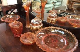 6 pieces of amber coloured glass including a vase.