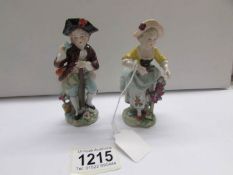 A pair of 19th century Sitzendorf figurines.