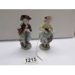 A pair of 19th century Sitzendorf figurines.