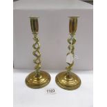 A good pair of brass barley twist stem candlesticks.