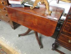 A mahogany Pembroke table.