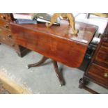 A mahogany Pembroke table.