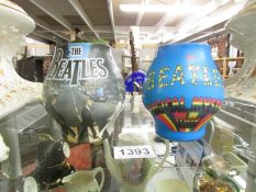 2 'Beatles' candles.