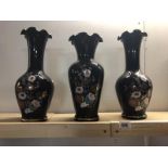 3 large black glass vases featuring fluted tops with gilt edging and transfers of flowers and birds