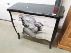 A 3 drawer chest depicting Marilyn Monroe.