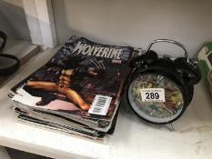 A quantity of Marvel magazines including Wolverine, Captain America and Hulk, plus a Marvel clock.