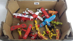 A quantity of unboxed model aircraft.