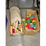 2 boxes of wooden building blocks.