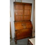 An oak bureau book case.