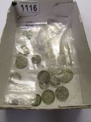 A quantity of pre 1920 and pre 1947 coins, approximately 2.5 ounces in total.