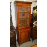 A mahogany bookcase.