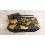 A Japanese battery operated toy tank with logo mark for YONEZAWA.