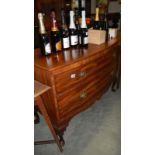 A mahogany 2 drawer bow front chest.