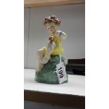 A Royal Worcester figurine 'Friday's Child'.