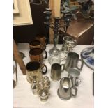 A candelabra, pewter tankards, signed Leicester City tankard etc.