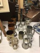 A candelabra, pewter tankards, signed Leicester City tankard etc.