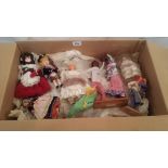 A collection of foreign dolls including some boxed.