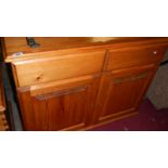 A pine 2 door cupboard.