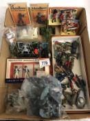 A large quantity of plastic and lead soldiers etc including Britians.