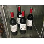 4 bottles of Chateau Berdet red wine.