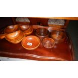 A tray of wooden bowls.
