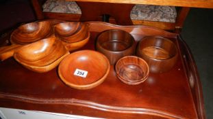 A tray of wooden bowls.