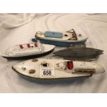 2 Sutcliffe tinplate clockwork boats, a submarine and 1 other boat.