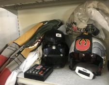 Cosplay - Darth Vader helmet, Rebel fighter helmet, Jedi cape and a Boba Fett outfit.