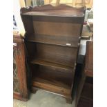 A mahogany book case.