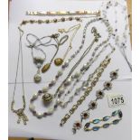 A mixed lot of necklaces, pendants and bracelets.