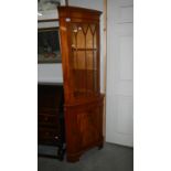 A mahogany corner unit.