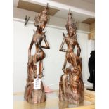 2 carved mahogany Asian figures.