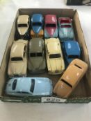 10 good 1950's Dinky saloon cars including 5 duo-tone examples.