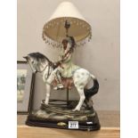 An American Indian chief on horseback as a table lamp.