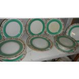 A dessert set comprising of 3 comports and 7 plates.
