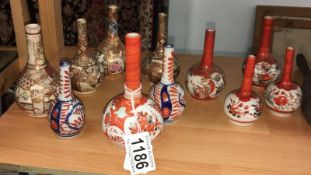 11 miniature Satsuma vases.