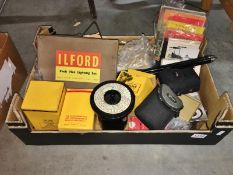 A box of photographic items.