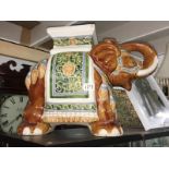A pottery elephant seat.