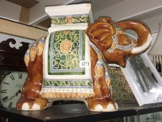 A pottery elephant seat.